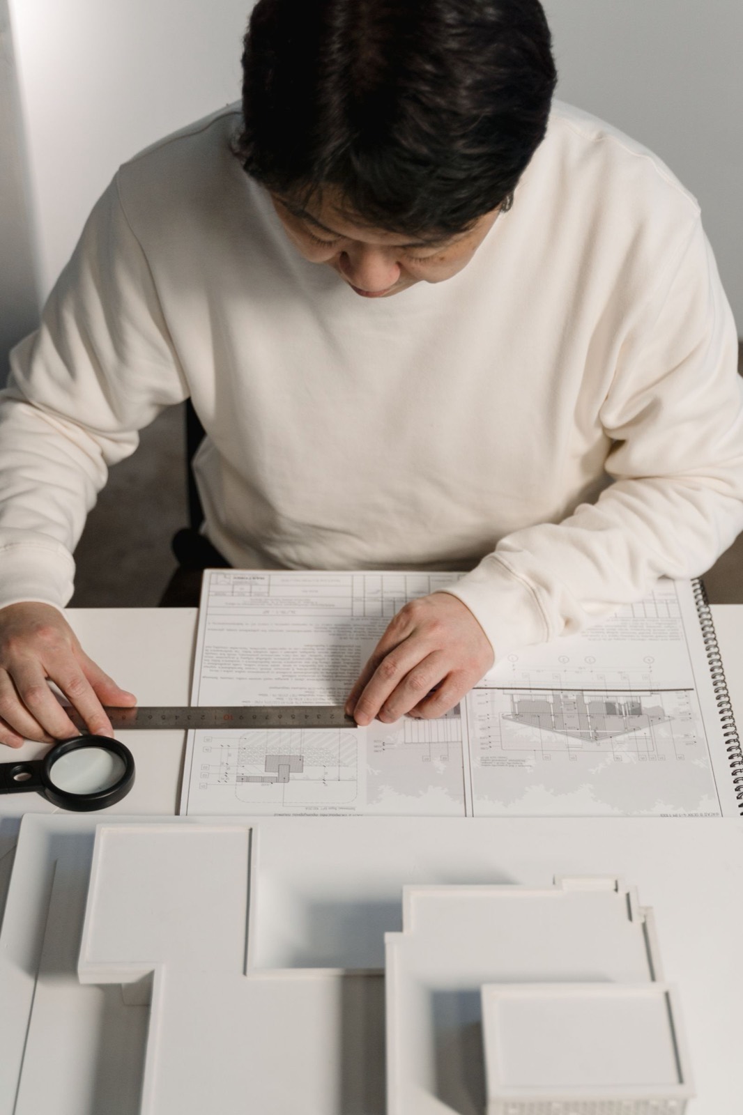 Blueprints on the review table